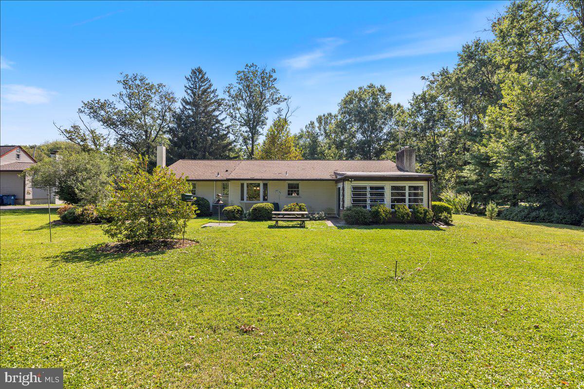 1714 Moyers Road Hatfield, PA 19440 - Photo 27 of 31 a front view of house with yard and swimming pool