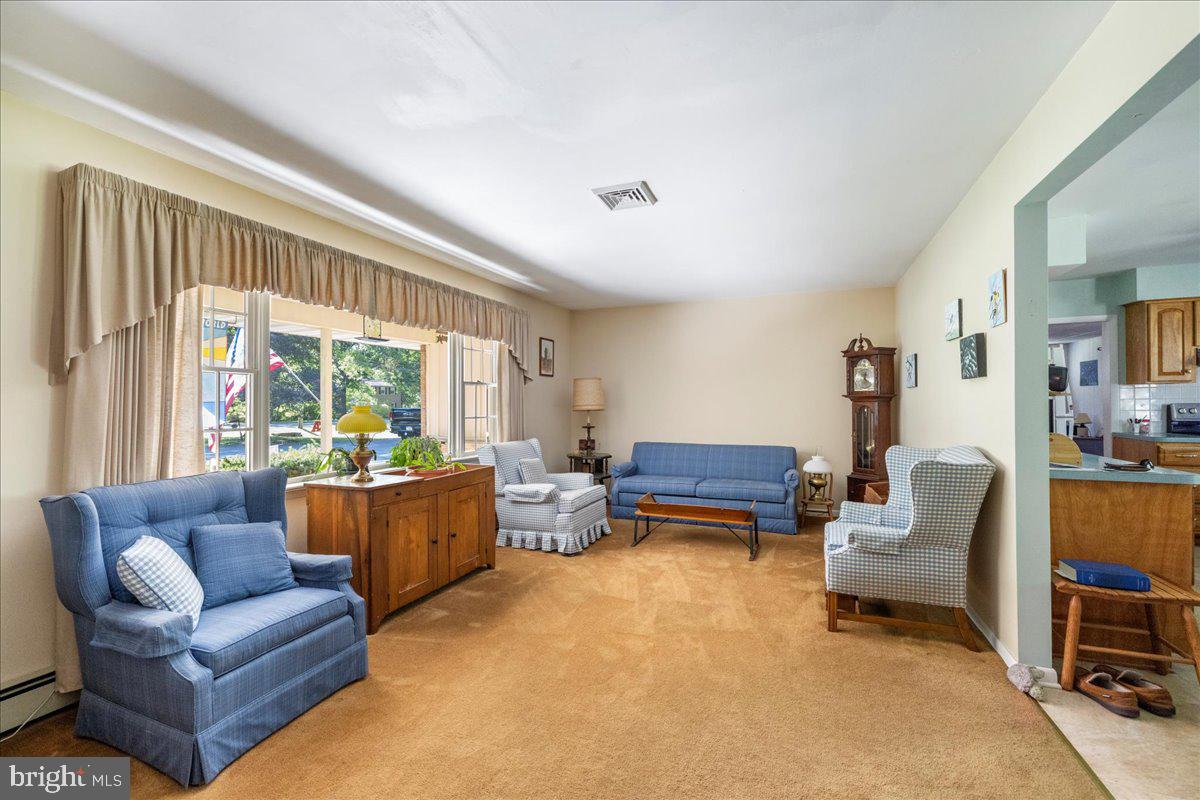 1714 Moyers Road Hatfield, PA 19440 - Photo 4 of 31 a living room with furniture and a large window