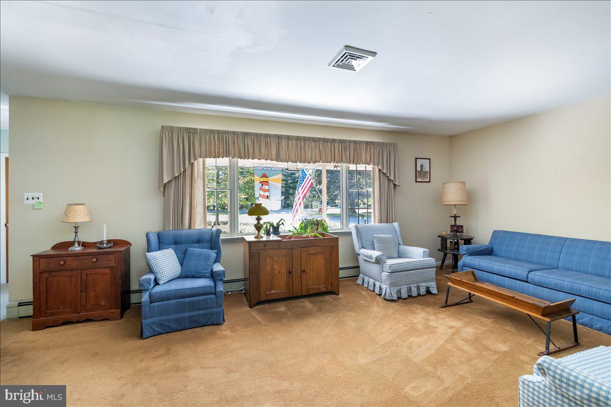 1714 Moyers Road Hatfield, PA 19440 - Photo 5 of 31 a living room with furniture and a window