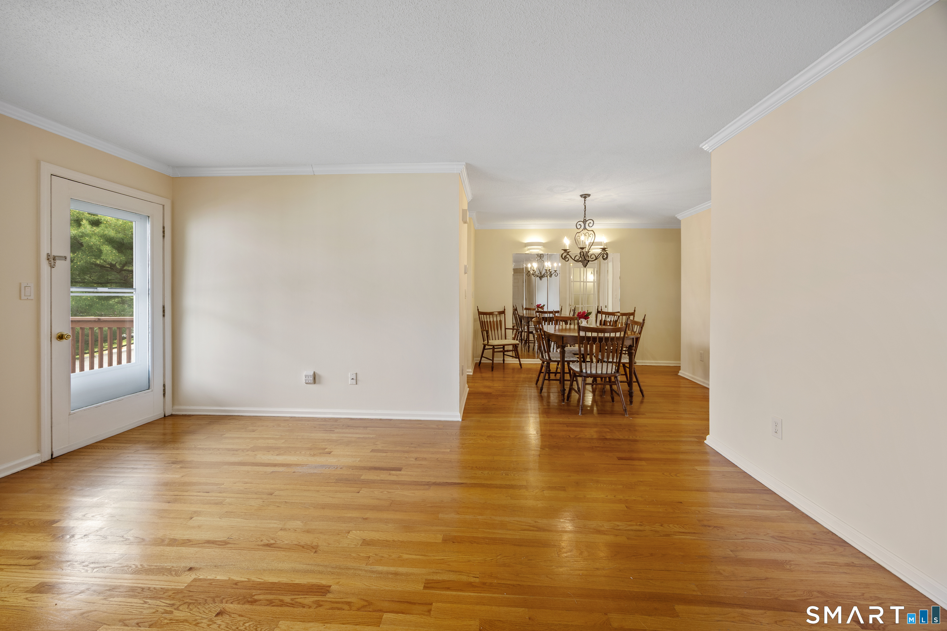 111 Strathmore Lane, Unit 111 Wallingford, CT 06492 - Photo 3 of 32 Living room as seen from the front door