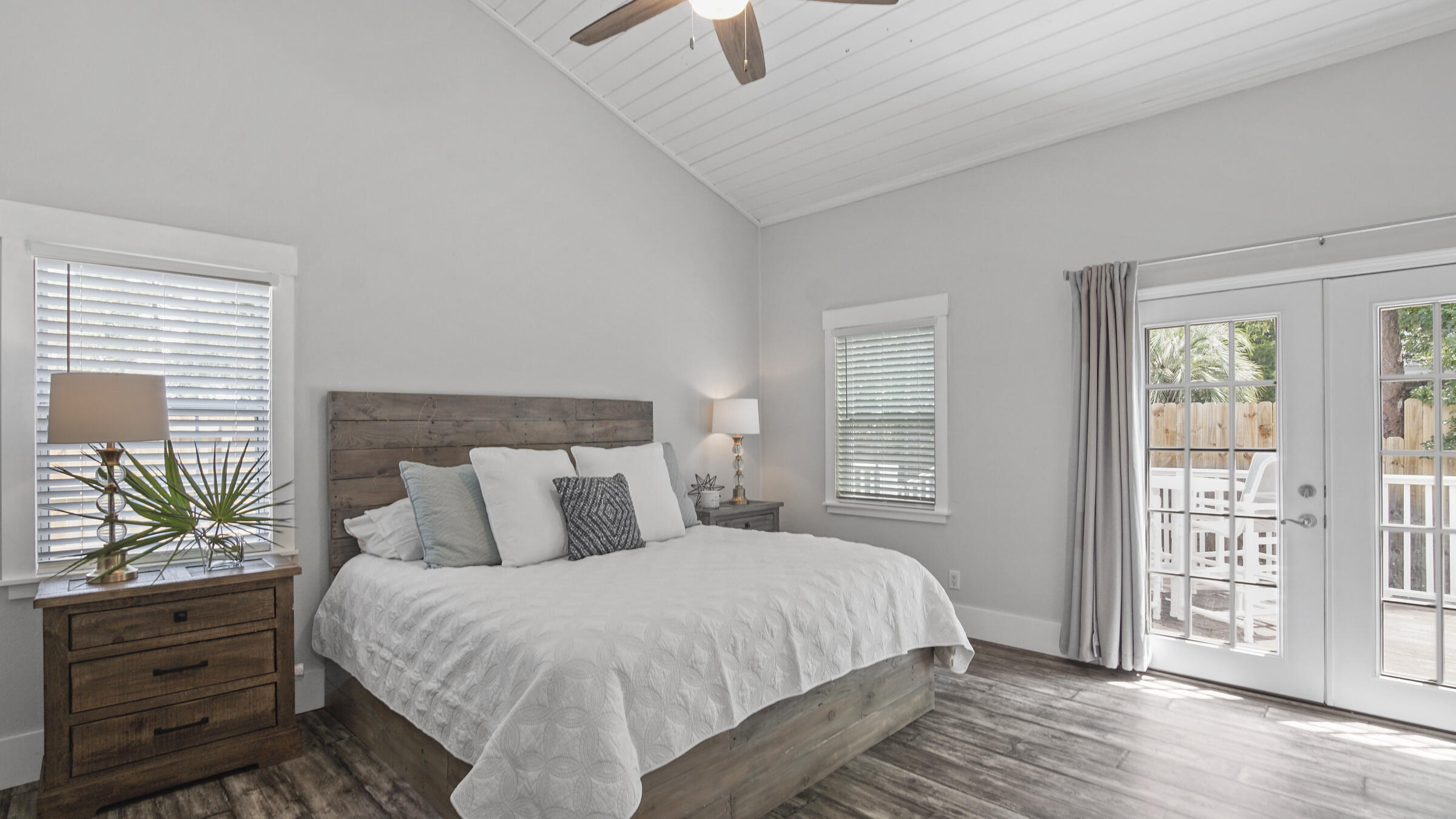 149 Acacia Street Santa Rosa Beach, FL 32459 - Photo 11 of 45 a bedroom with a bed and a window