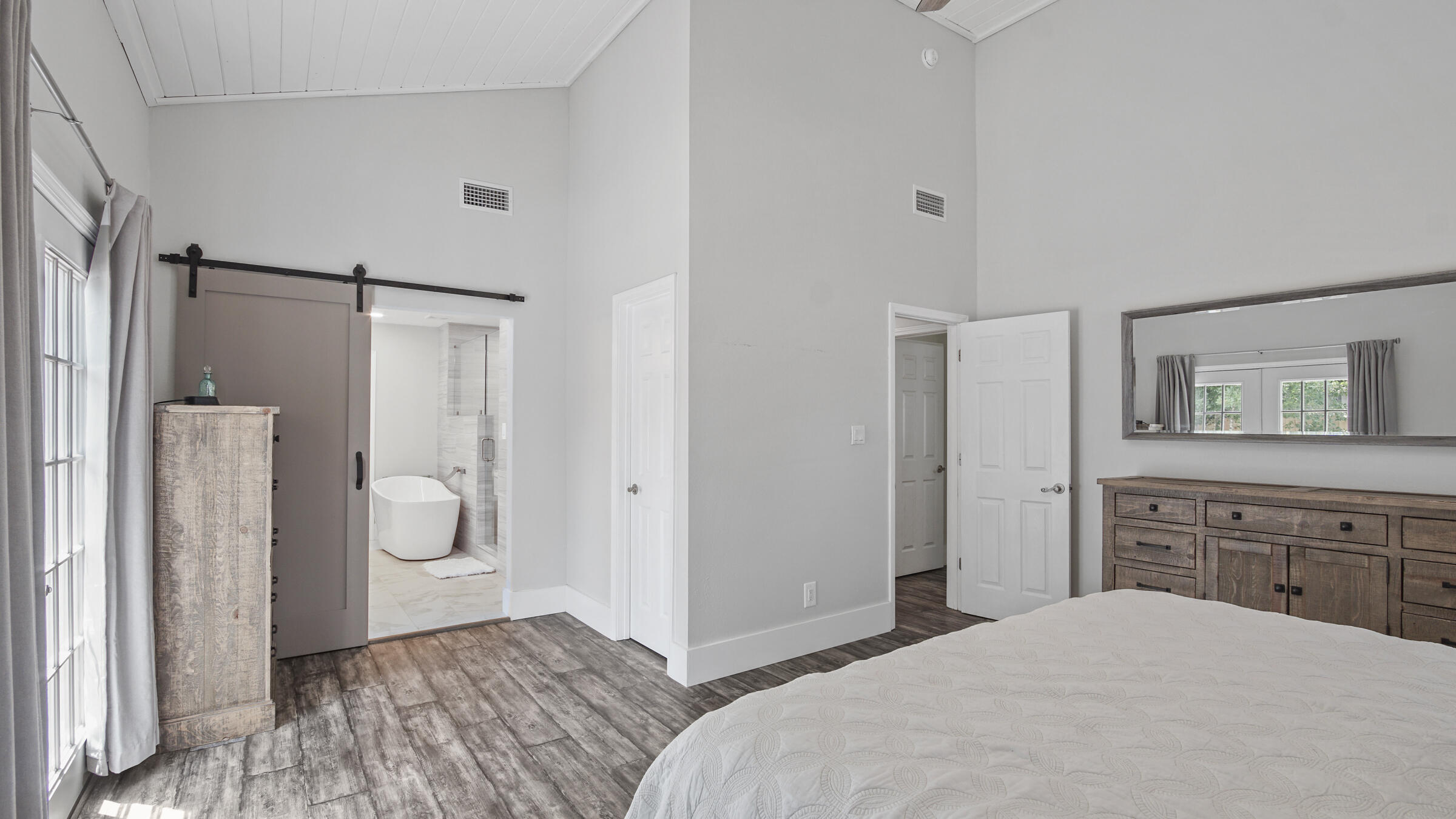 149 Acacia Street Santa Rosa Beach, FL 32459 - Photo 14 of 45 a bedroom with a bed and a bathroom