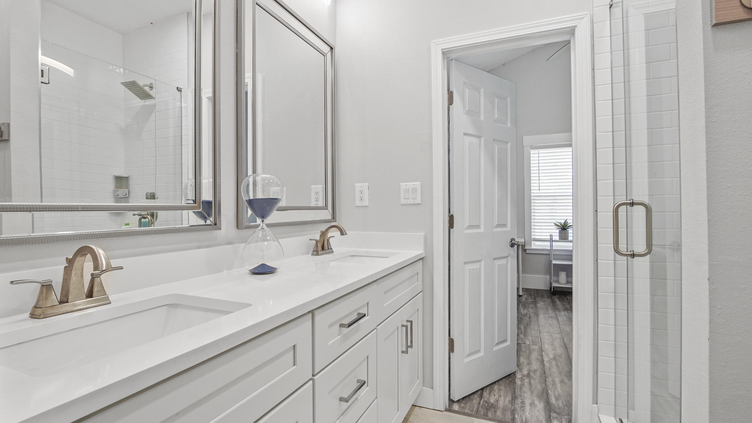 149 Acacia Street Santa Rosa Beach, FL 32459 - Photo 21 of 45 a bathroom with a sink and a mirror with shower