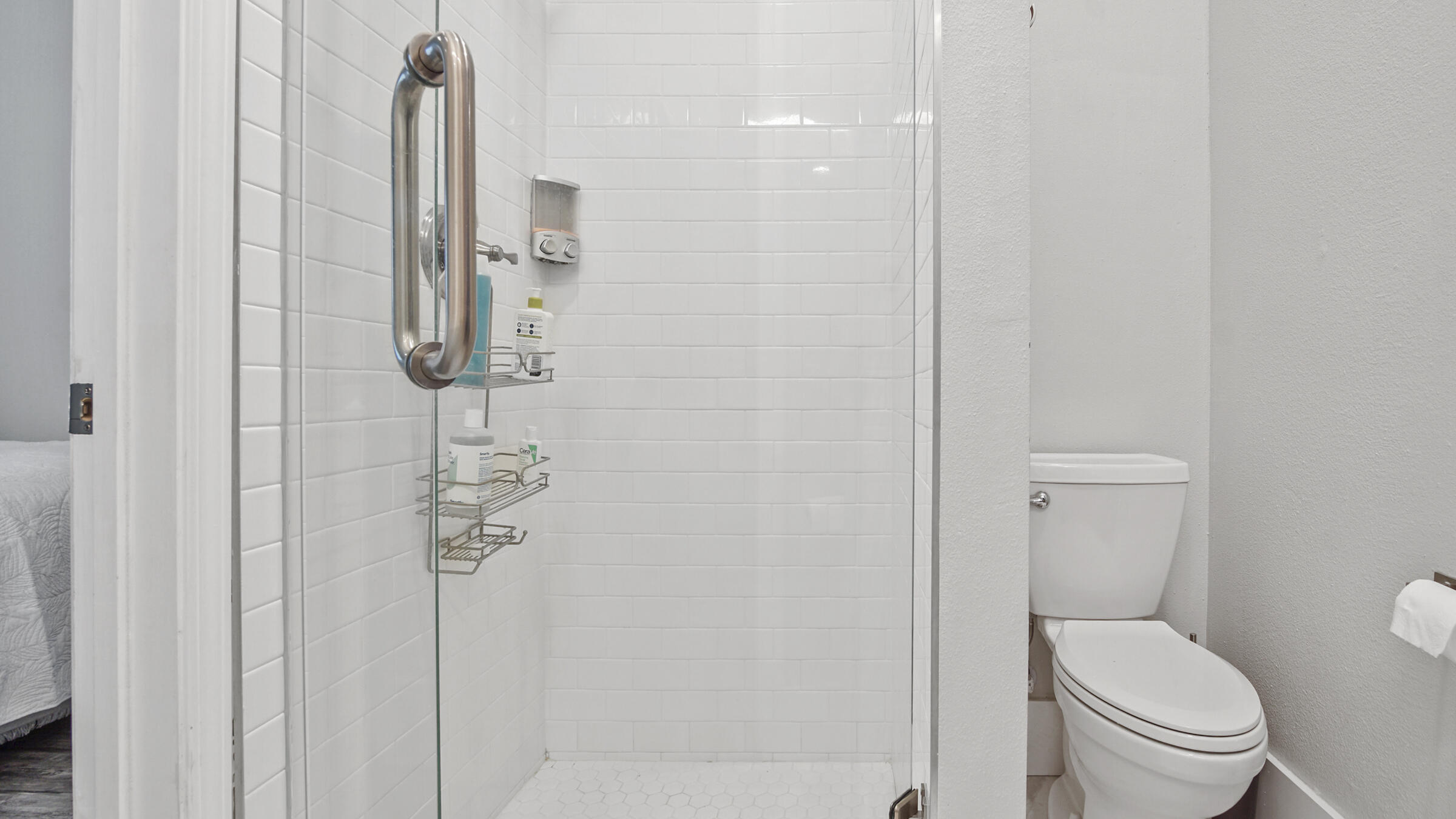 149 Acacia Street Santa Rosa Beach, FL 32459 - Photo 22 of 45 a white toilet sitting next to a shower