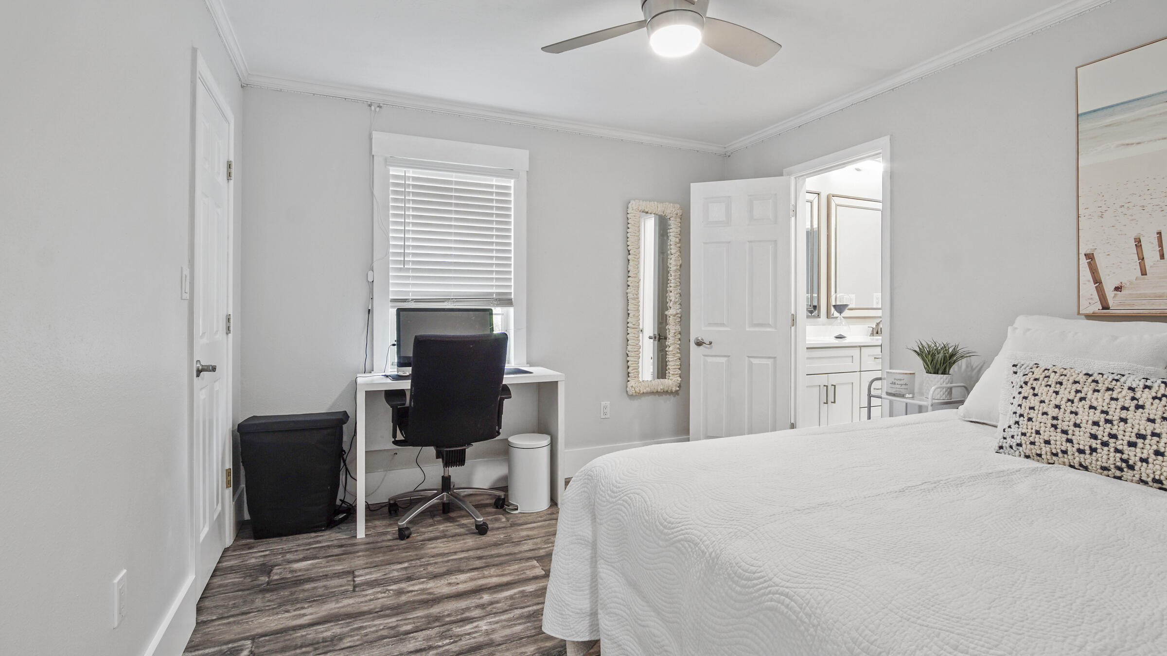 149 Acacia Street Santa Rosa Beach, FL 32459 - Photo 24 of 45 a bedroom with a bed a table and chair