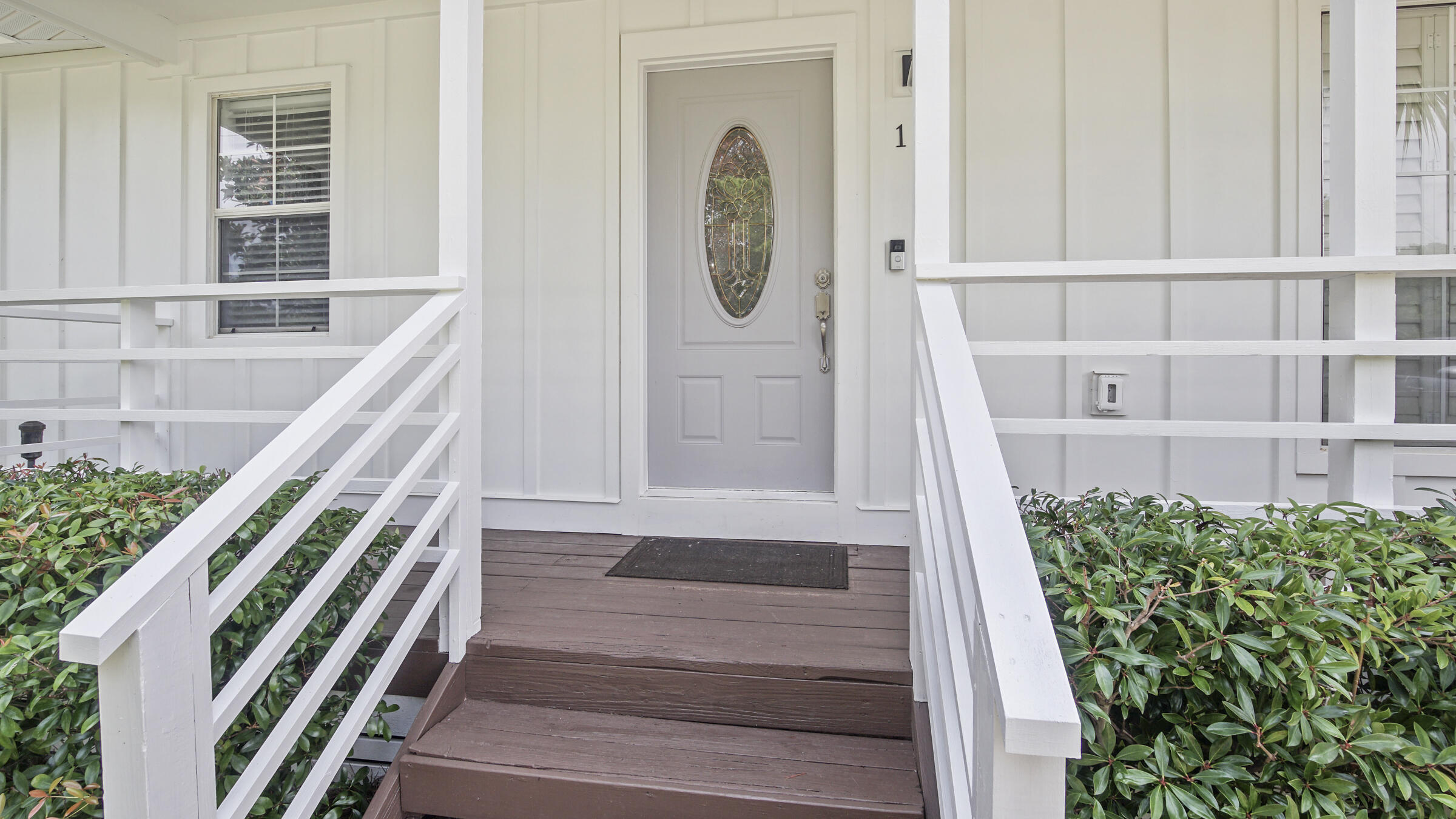 149 Acacia Street Santa Rosa Beach, FL 32459 - Photo 3 of 45 a view of staircase with large window and wooden floor