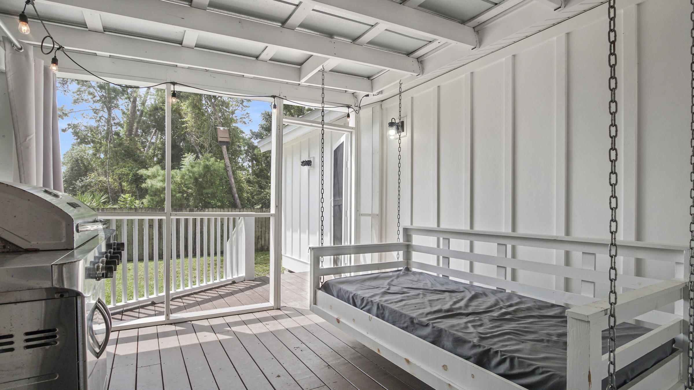149 Acacia Street Santa Rosa Beach, FL 32459 - Photo 30 of 45 a view of a balcony with chair
