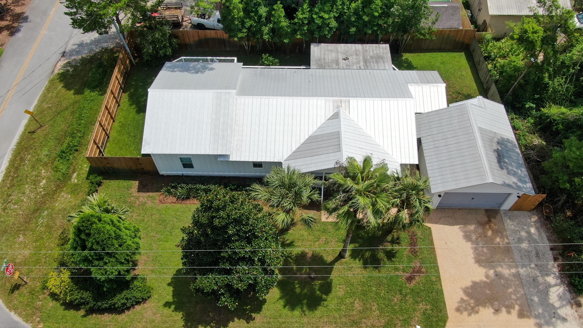 149 Acacia Street Santa Rosa Beach, FL 32459 - Photo 41 of 45 an aerial view of a house with a yard