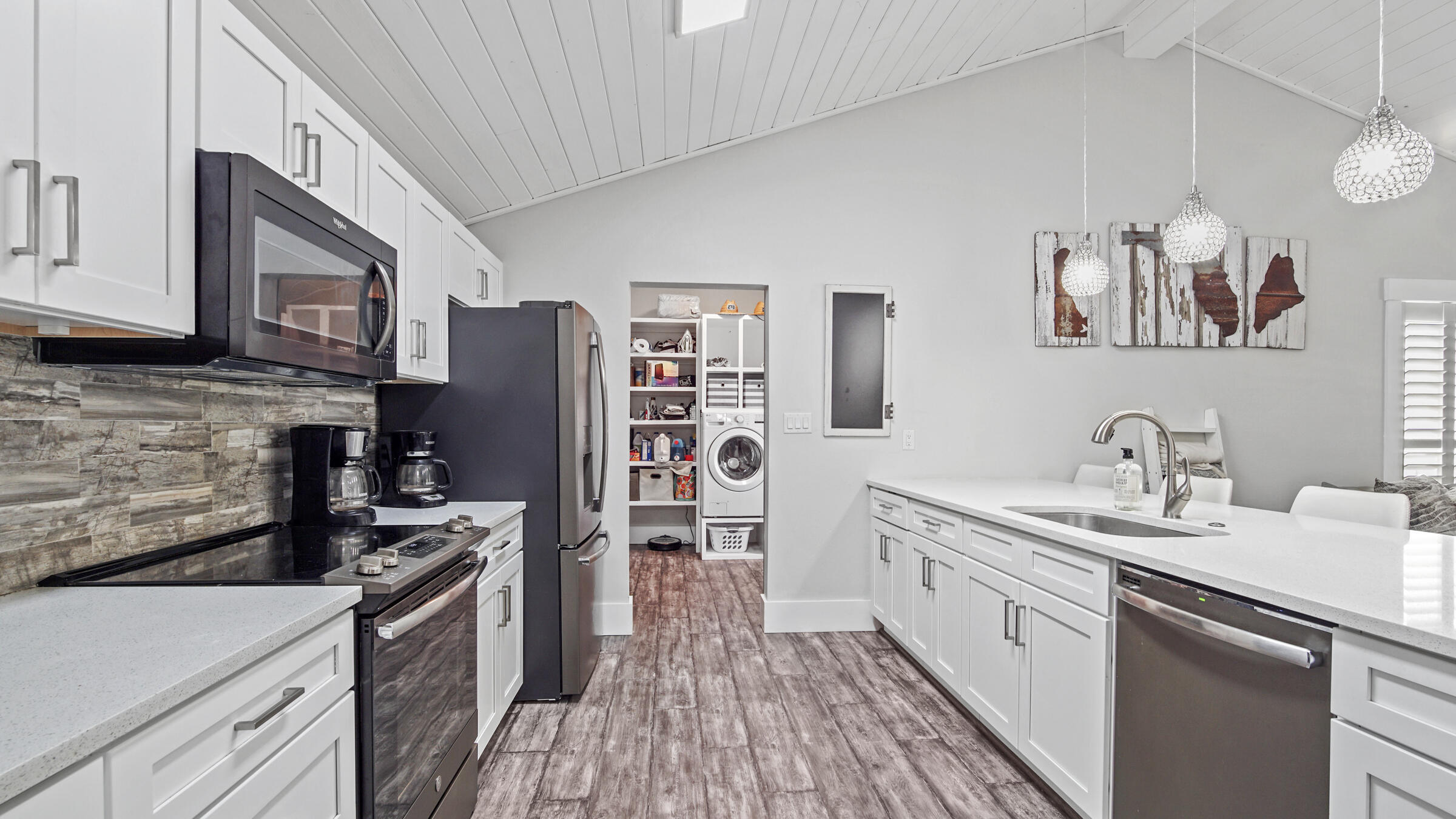 149 Acacia Street Santa Rosa Beach, FL 32459 - Photo 5 of 45 a kitchen with a sink stove and refrigerator