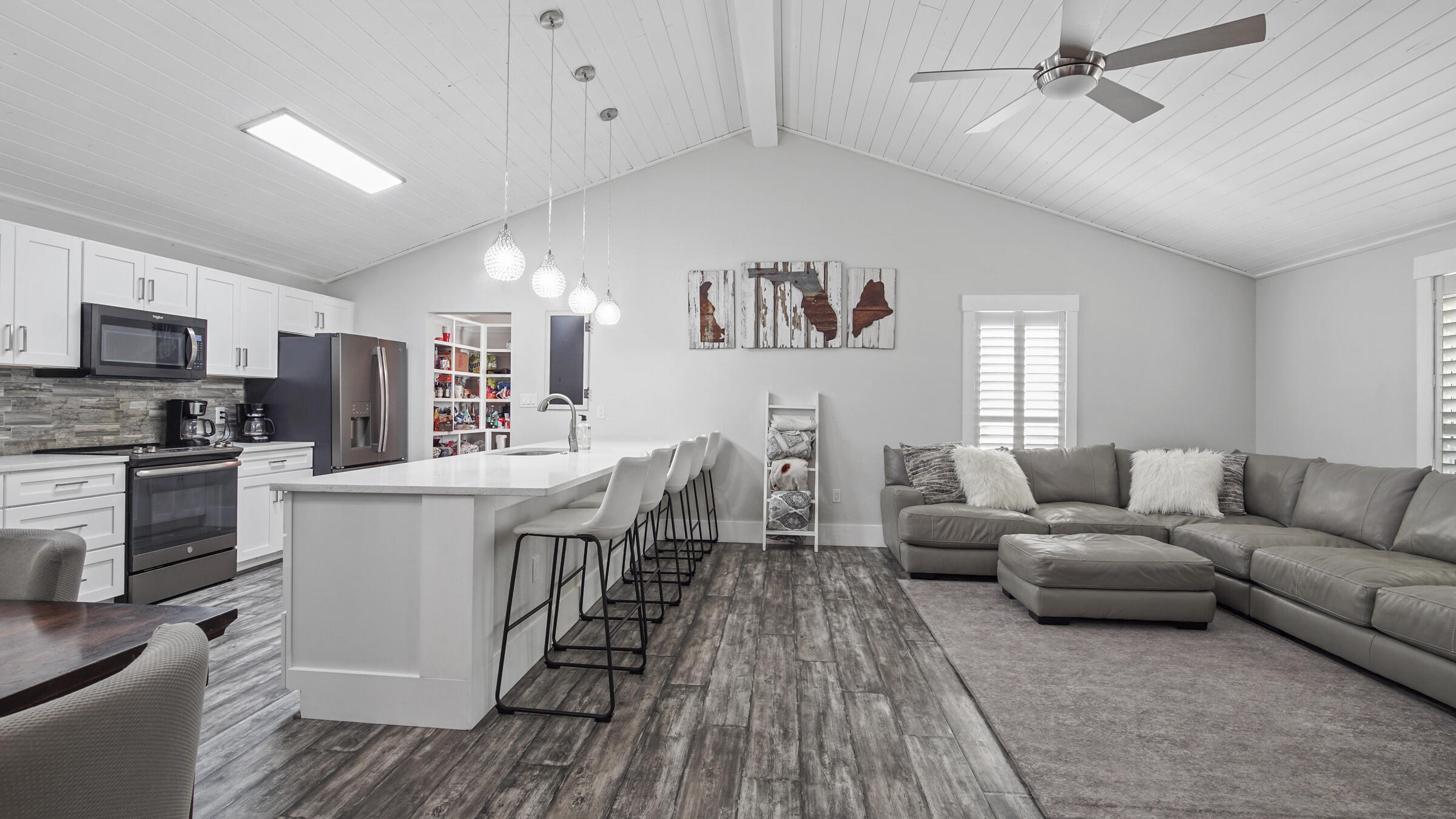 149 Acacia Street Santa Rosa Beach, FL 32459 - Photo 8 of 45 a living room with furniture and a wooden floor