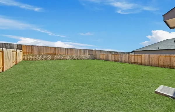 a view of a backyard with a garden