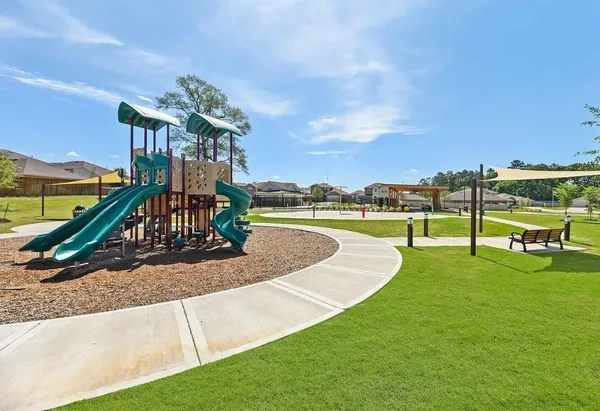 a view of a park with swings
