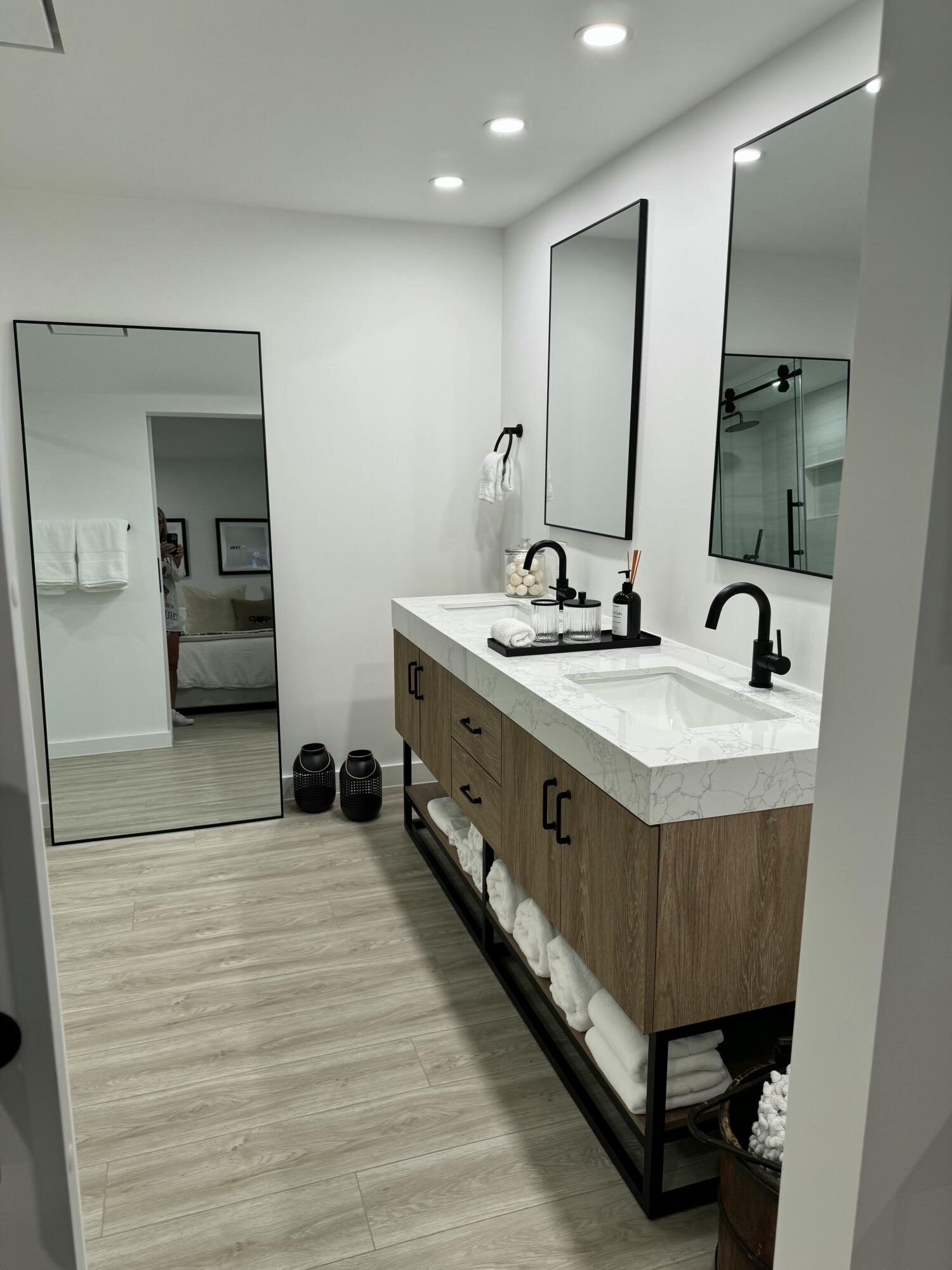 13400 Polo Road West Wellington, FL 33414 - Photo 14 of 16 a spacious bathroom with a double vanity sink and a mirror