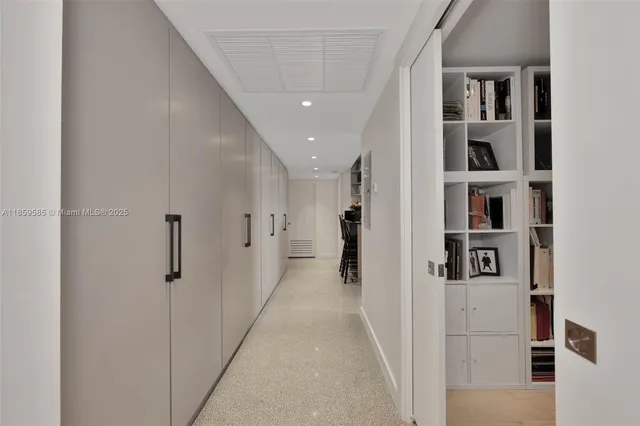 a view of a hallway with closet