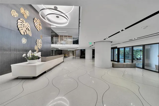 a view of staircase with a rug and a window