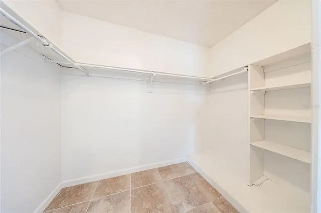 a view of an empty walk in closet