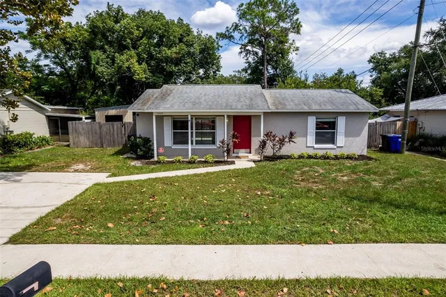 front view of a house with a yard