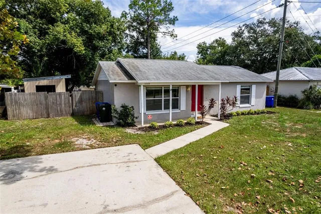 front view of a house with a yard