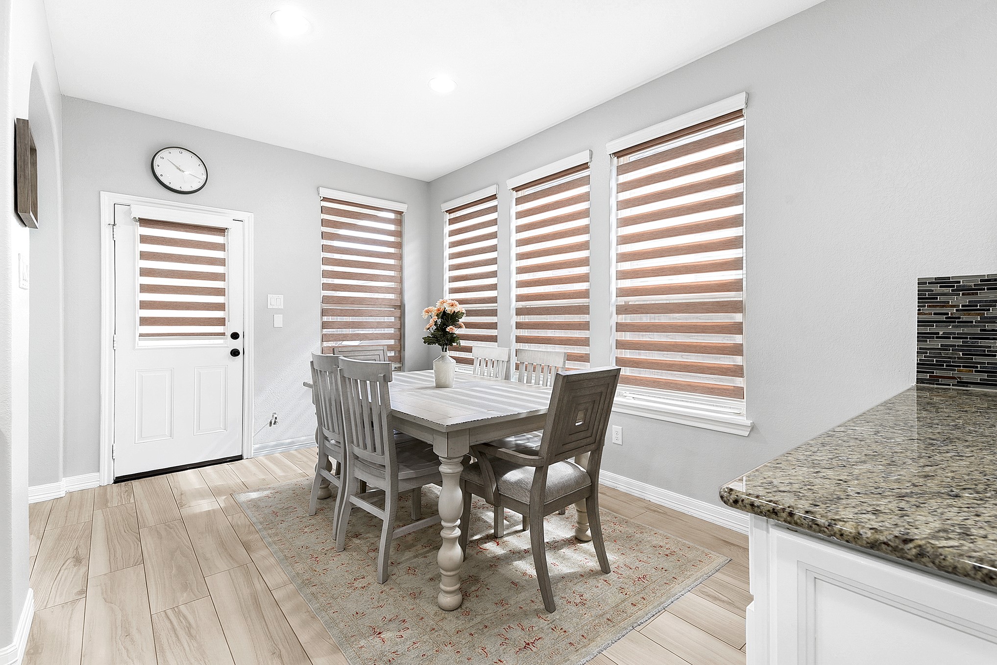 29022 Pinnacle Ridge Drive Katy, TX 77494 - Photo 20 of 45 a view of a dining room with furniture and wooden floor