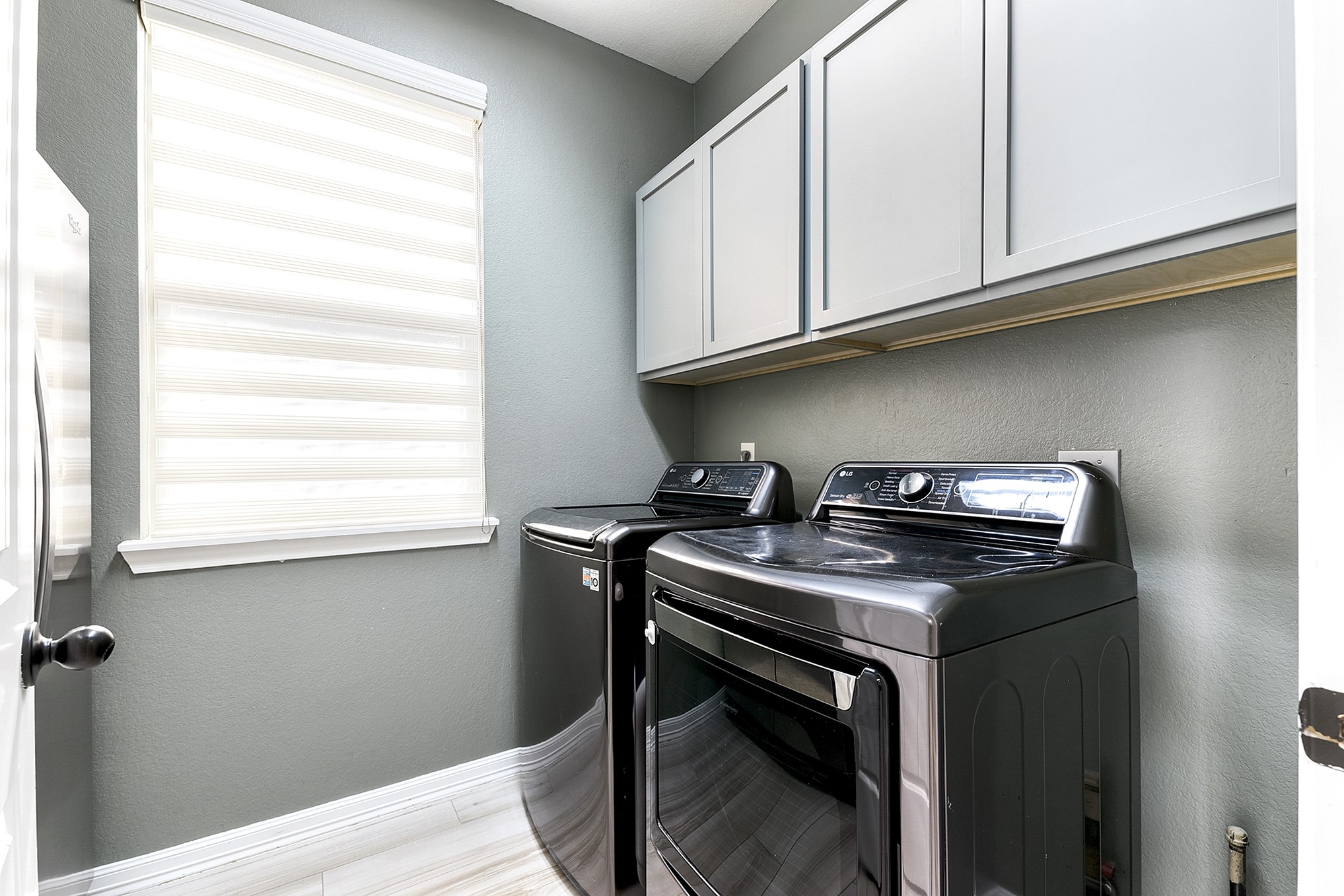 29022 Pinnacle Ridge Drive Katy, TX 77494 - Photo 24 of 45 a kitchen with stainless steel appliances granite countertop a stove a sink and a microwave