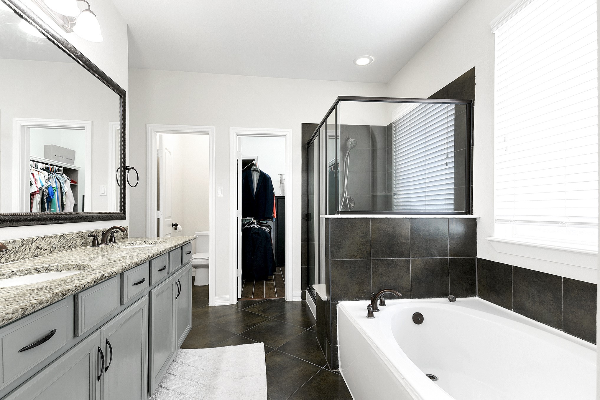 29022 Pinnacle Ridge Drive Katy, TX 77494 - Photo 27 of 45 a bathroom with a bathtub and a sink