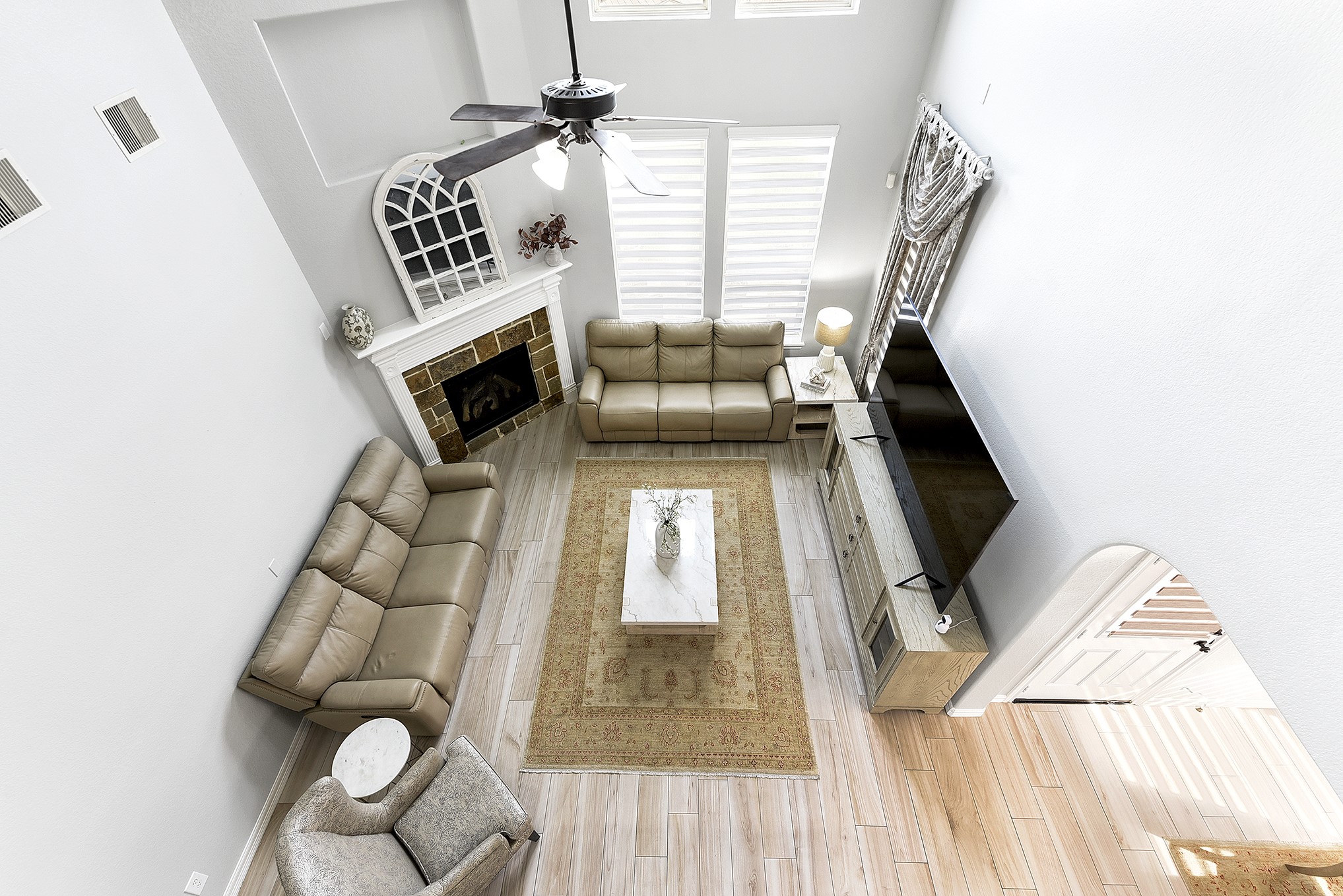 29022 Pinnacle Ridge Drive Katy, TX 77494 - Photo 38 of 45 a living room with furniture and a fireplace