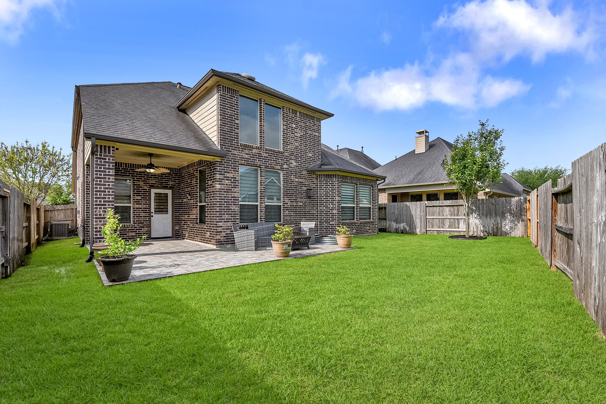29022 Pinnacle Ridge Drive Katy, TX 77494 - Photo 43 of 45 a front view of a house with a garden and patio