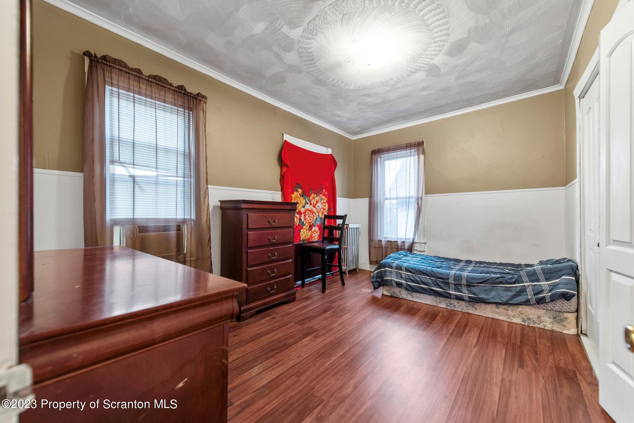 726 Hickory Street Scranton, PA 18505 - Photo 13 of 26 a living room with furniture and wooden floor