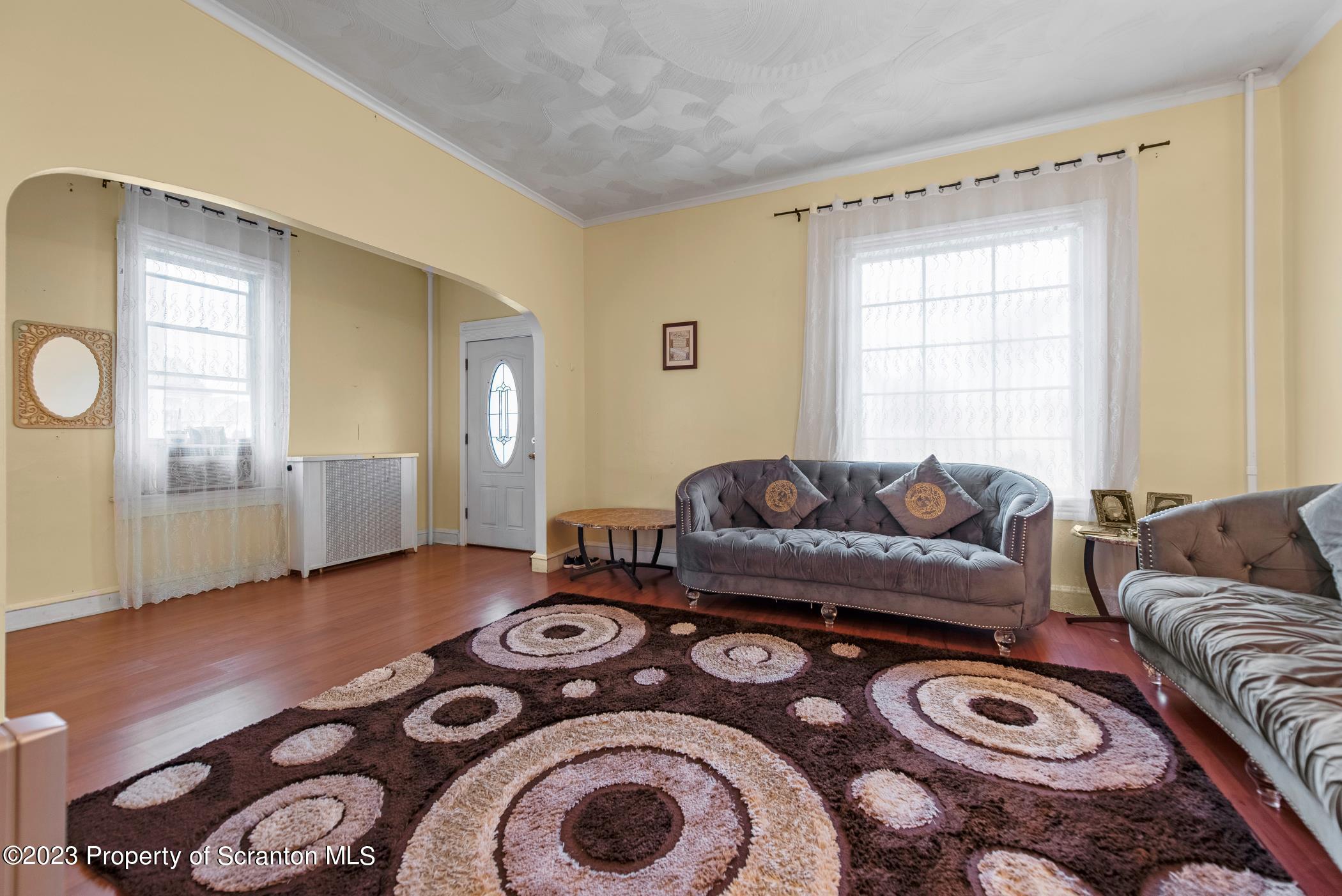 726 Hickory Street Scranton, PA 18505 - Photo 5 of 26 a living room with furniture and a window