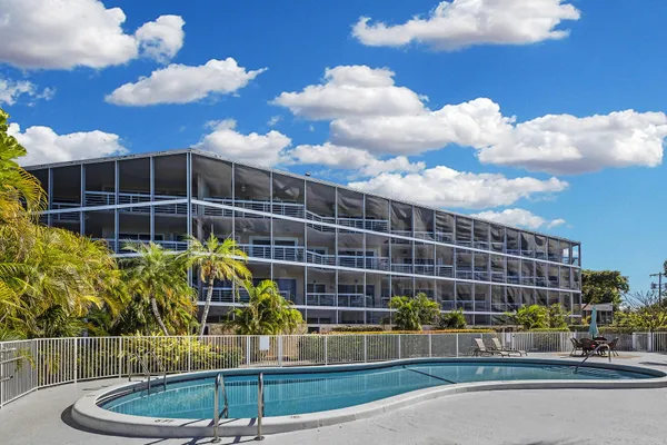 a view of staircase with white walls