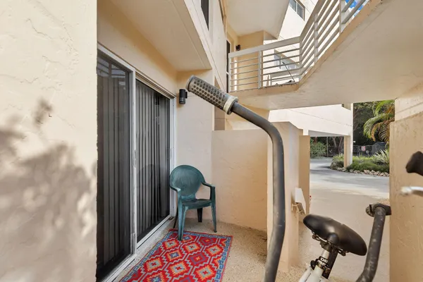 a view of a bench in front of a house