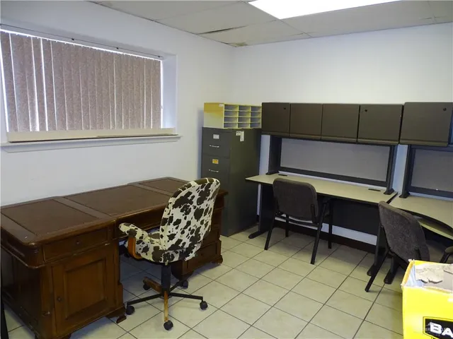 a view of a big yard with lots of green space