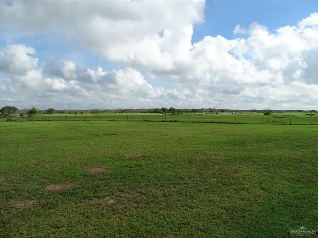 a view of a golf course with a garden