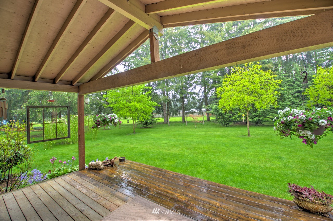 18101 Canaday Lane Southwest Rochester, WA 98579 - Photo 2 of 32 a view of backyard with green space