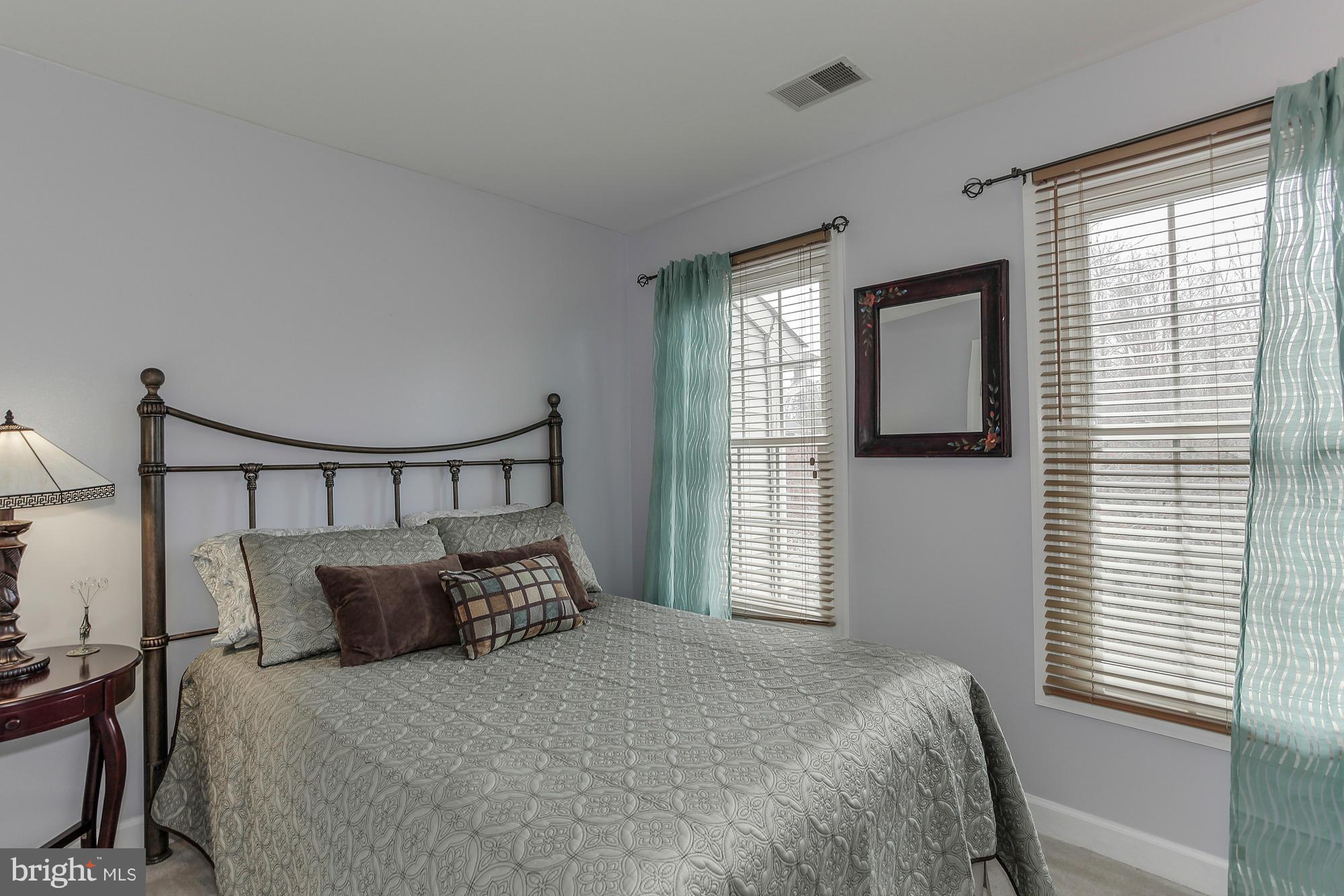 3504 Hammerstone Road Laurel, MD 20724 - Photo 18 of 30 a bedroom with a bed and window