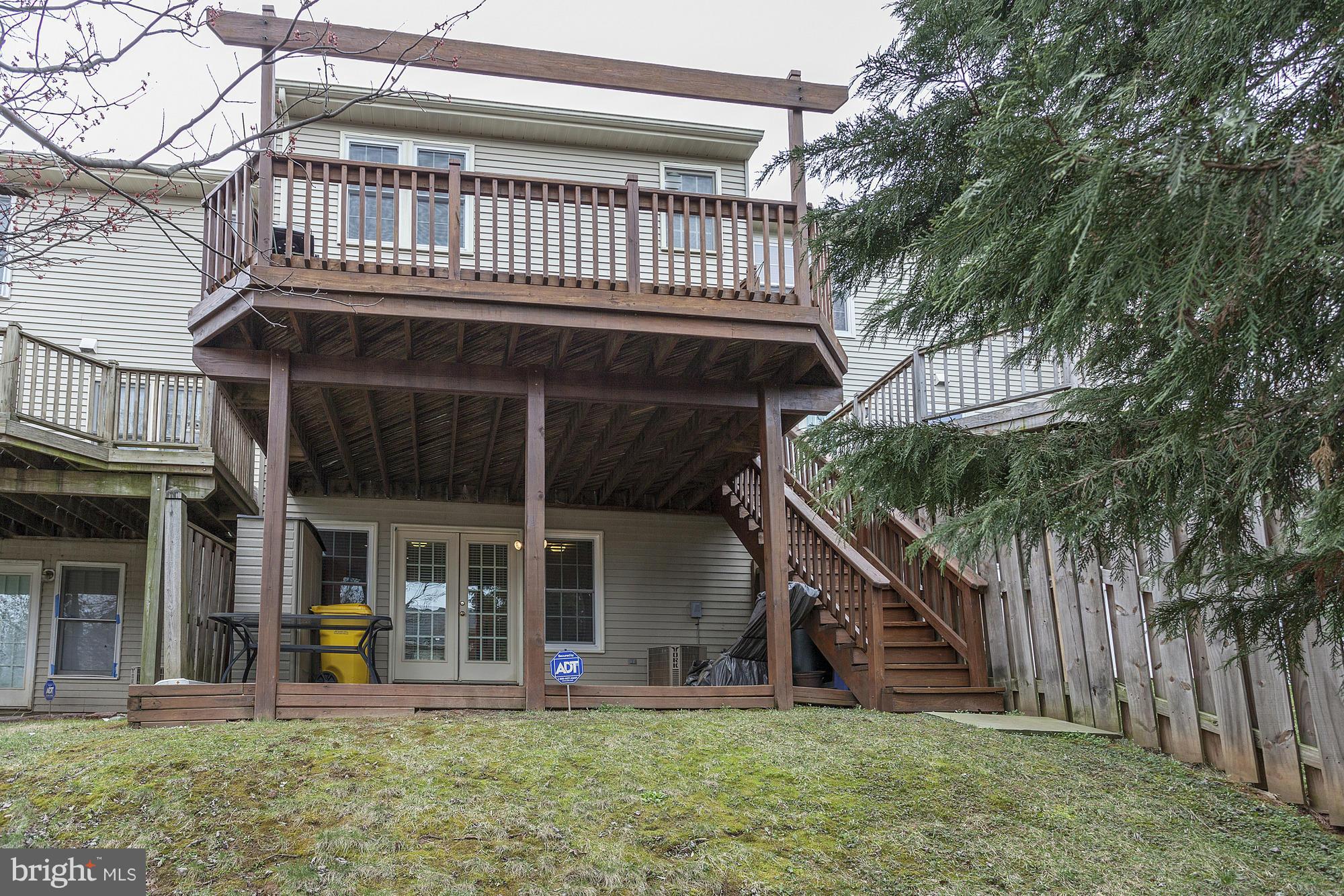 3504 Hammerstone Road Laurel, MD 20724 - Photo 25 of 30 a view of a house with backyard porch and sitting area