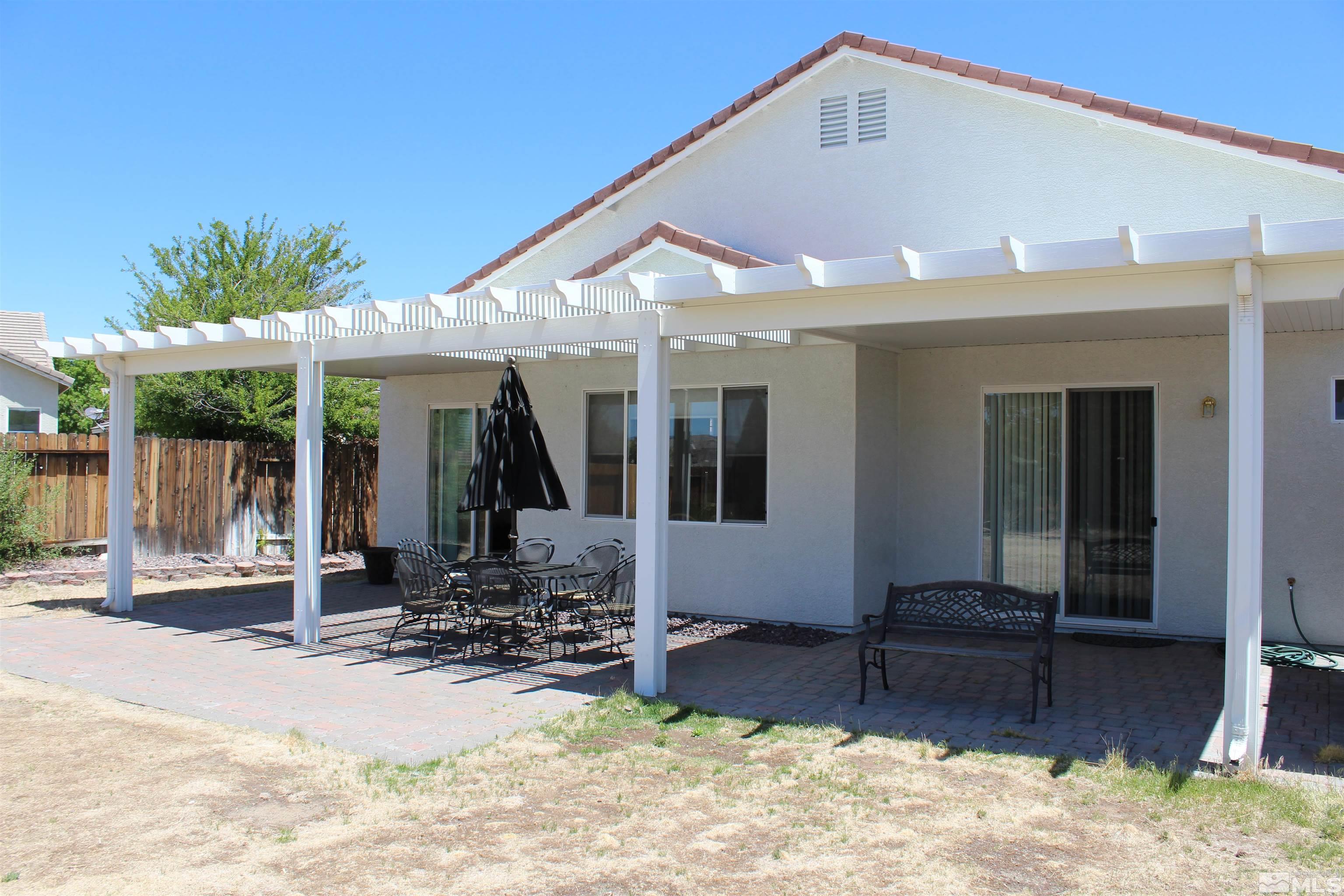 9533 Steep Climb Court Reno, NV 89521 - Photo 13 of 15 a front view of a house