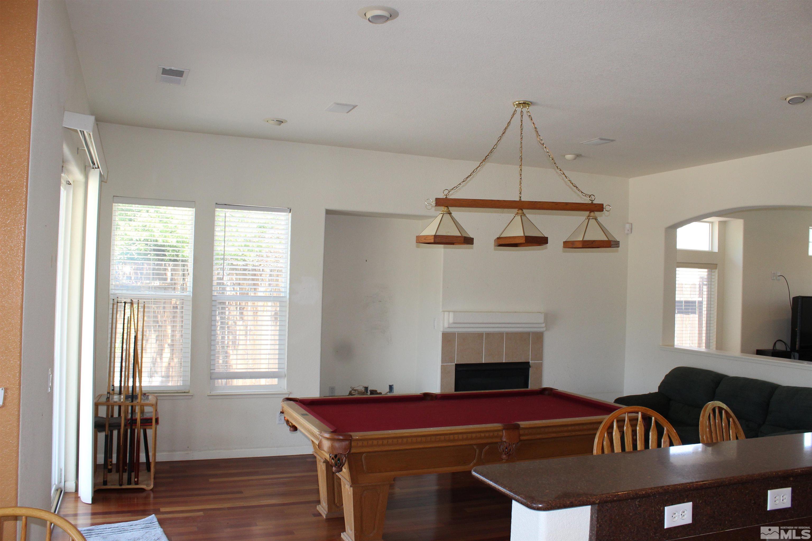 9533 Steep Climb Court Reno, NV 89521 - Photo 4 of 15 a dining room with furniture and window