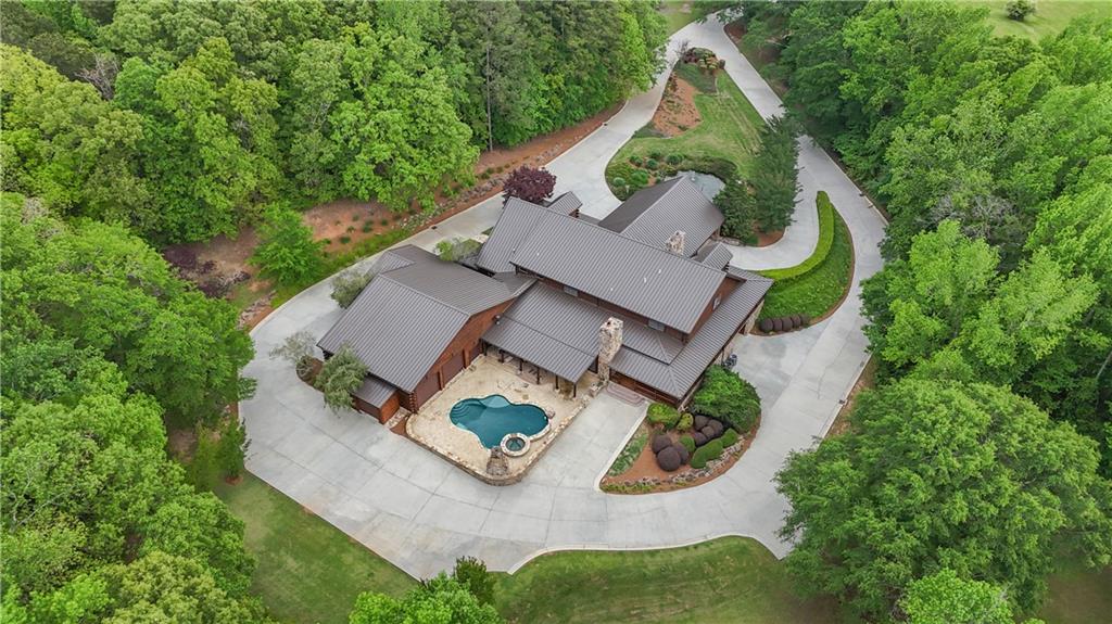14501 Woolsey Road Hampton, GA 30228 - Photo 11 of 143 an aerial view of a house with outdoor space