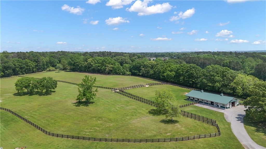 14501 Woolsey Road Hampton, GA 30228 - Photo 119 of 143 a view of a swimming pool with a yard