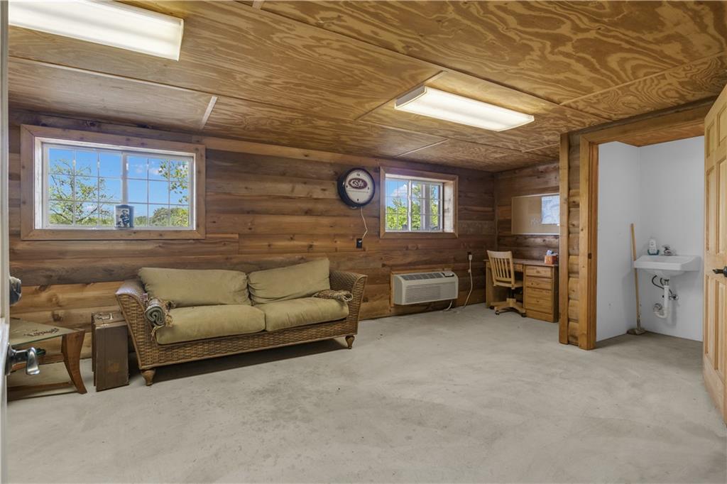 14501 Woolsey Road Hampton, GA 30228 - Photo 124 of 143 a living room with furniture and a window