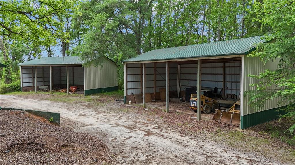 14501 Woolsey Road Hampton, GA 30228 - Photo 131 of 143 a view of a house with yard and a large window