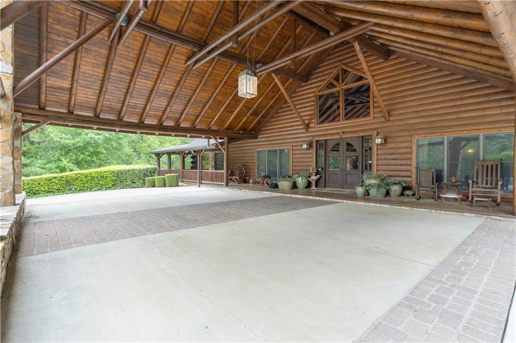 14501 Woolsey Road Hampton, GA 30228 - Photo 15 of 143 a row of palm trees in front of a house