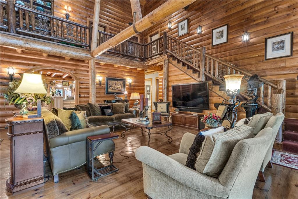 14501 Woolsey Road Hampton, GA 30228 - Photo 20 of 143 a view of a livingroom with furniture and a flat screen tv