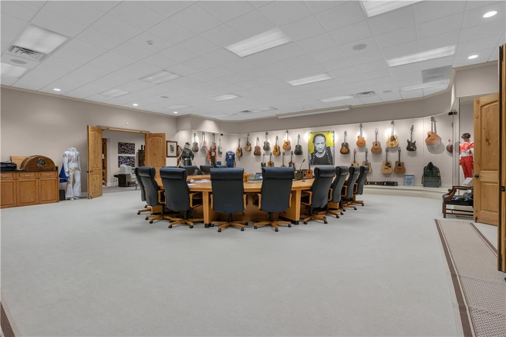 14501 Woolsey Road Hampton, GA 30228 - Photo 89 of 143 a room with gym equipment and a large window