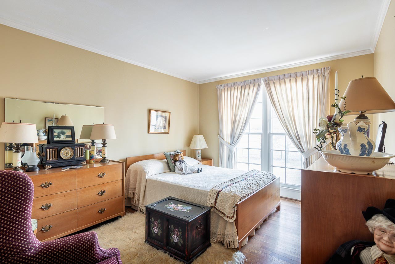 4832 Murfreesboro Road Arrington, TN 37014 - Photo 23 of 70 a bedroom with a bed and a couch