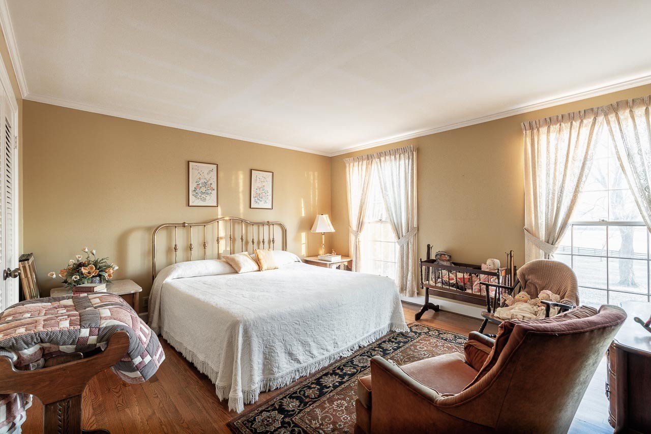 4832 Murfreesboro Road Arrington, TN 37014 - Photo 25 of 70 a bedroom with a bed and window