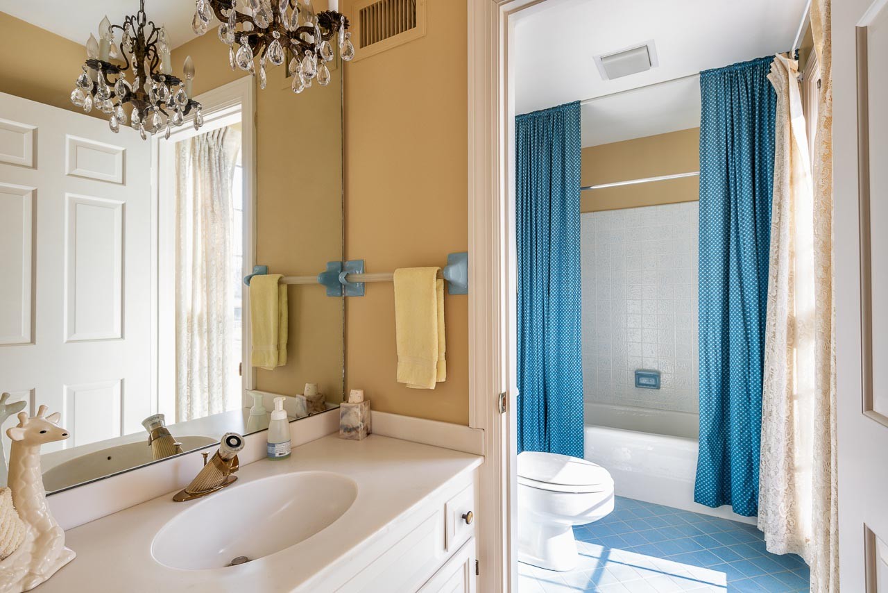 4832 Murfreesboro Road Arrington, TN 37014 - Photo 26 of 70 a bathroom with a granite countertop sink toilet and shower