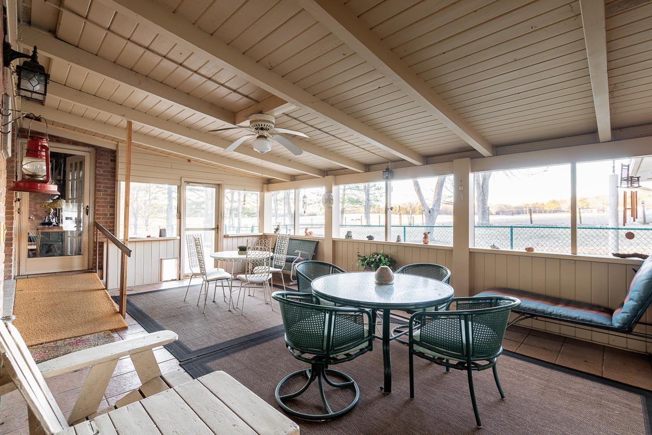 4832 Murfreesboro Road Arrington, TN 37014 - Photo 30 of 70 a living room with furniture a rug and a large window