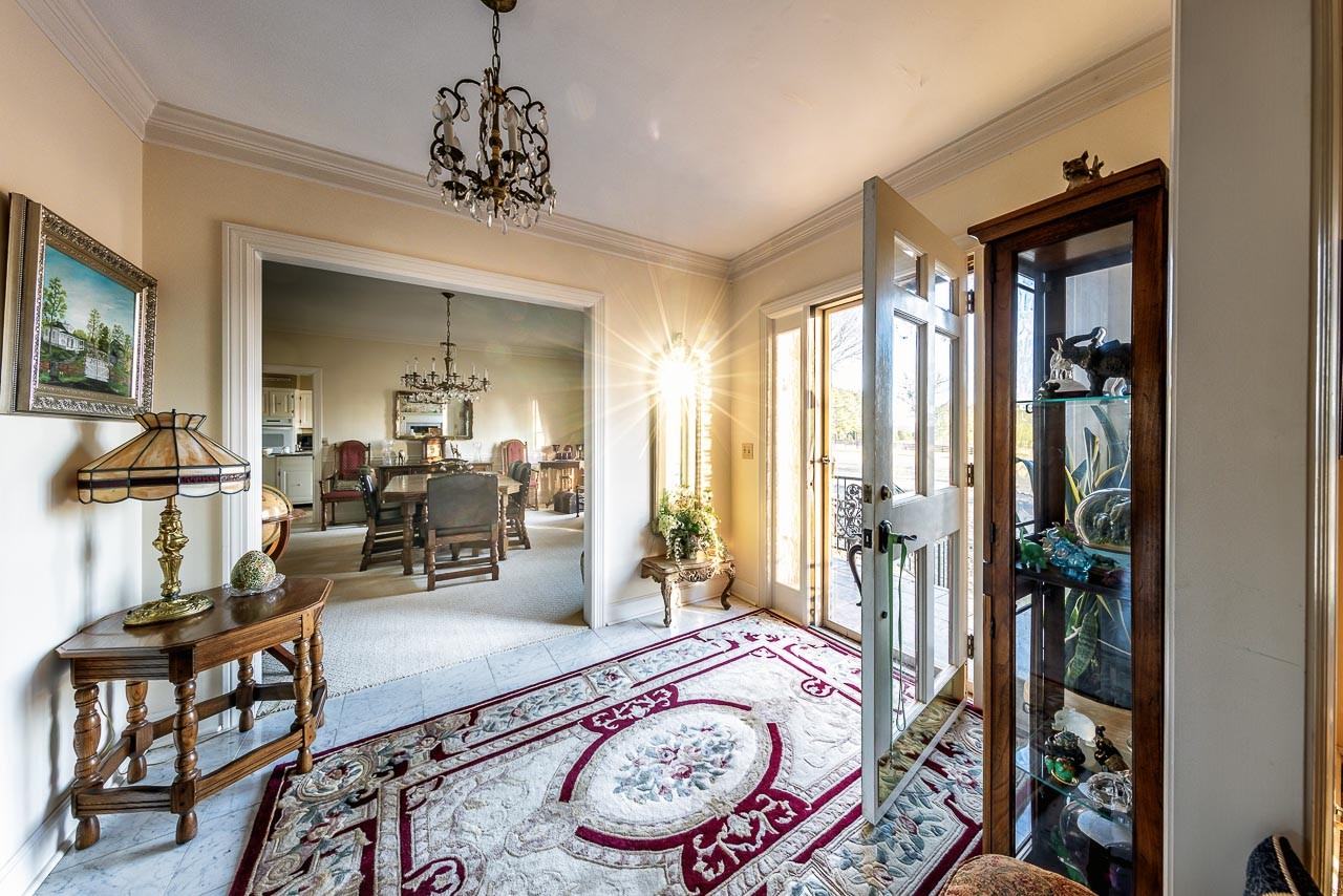 4832 Murfreesboro Road Arrington, TN 37014 - Photo 6 of 70 a living room with furniture and a chandelier